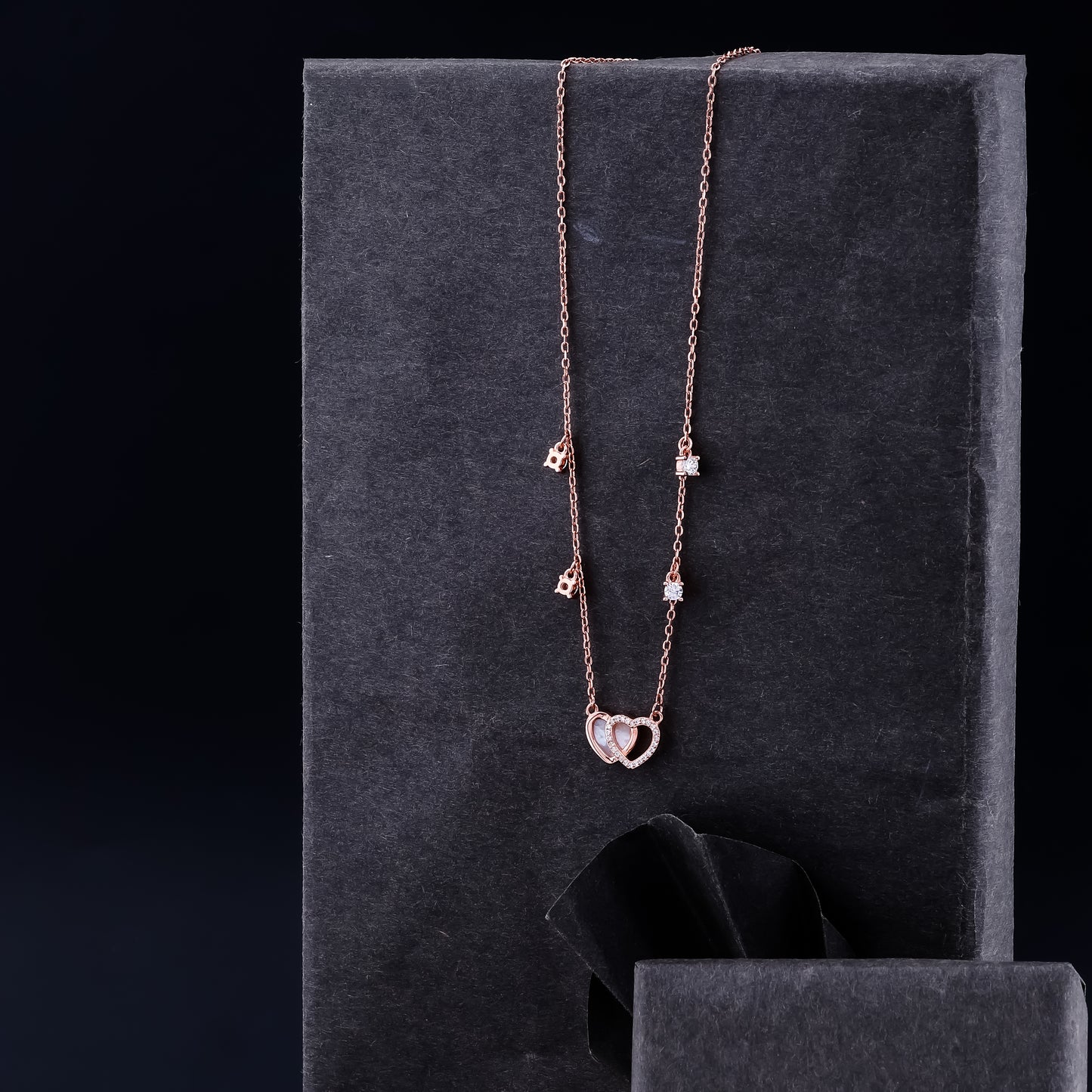 LINKED HEARTS NECKLACE